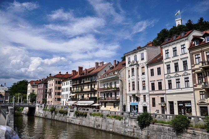 Historic Ljubljana Tour with Ljubljana Castle included - Town Hall and Church stops that add civic and faith context