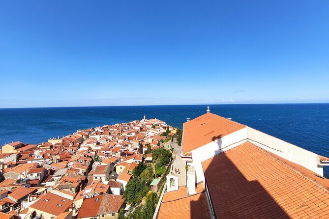 Piran Old Town Walking Tour - First of May Square and another church stop for extra context