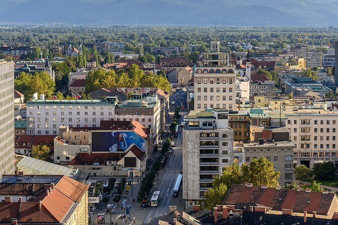 Private 3 hours walking Guided Immersion tour through Ljubljana - St. Nicholas Cathedral frontage: a short look before the ticket decision