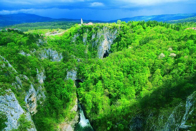 UNESCO's Skocjan Caves, Europe's largest underground canyon, Half Day Trip from Ljubljana - Stop at Škocjanske Jame: walking into Europe’s biggest underground canyon