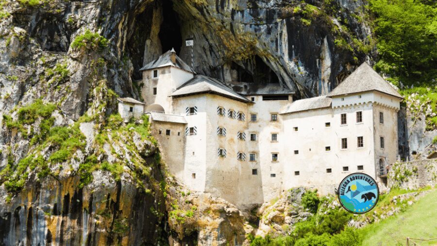 Zagreb: Postojna Cave, Predjama Castle & Ljubljana in a Day - Predjama Castle in a cliff: medieval drama with real atmosphere